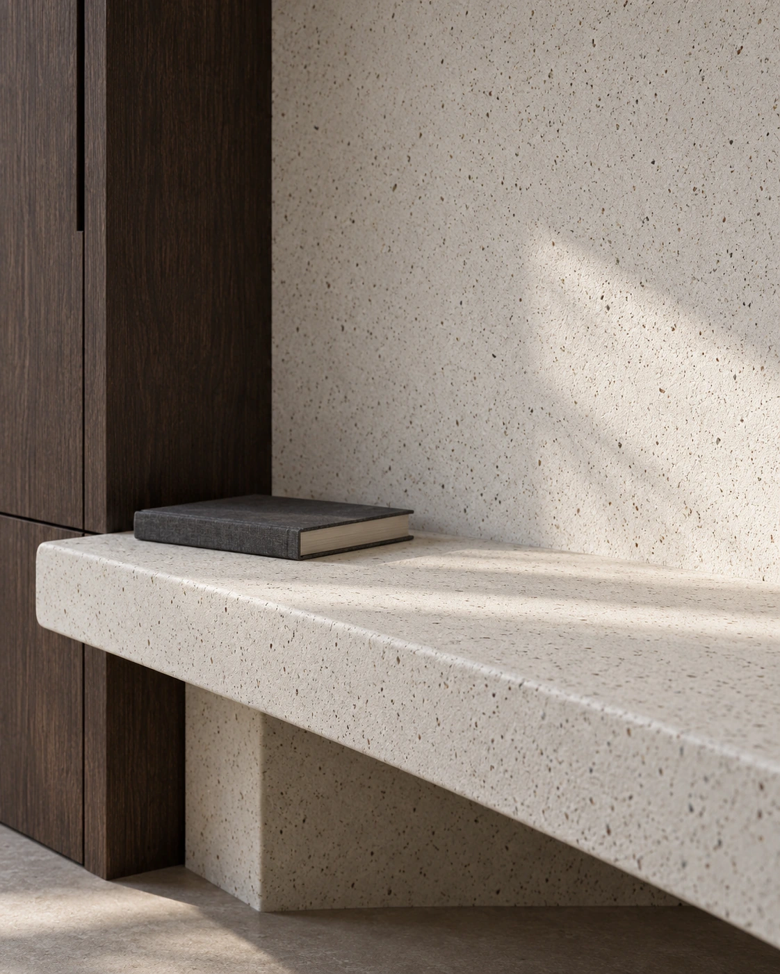 application concept: fine irregular inclusions in a pale Upcycle Clay wall and coated ledge beside dark timber.
