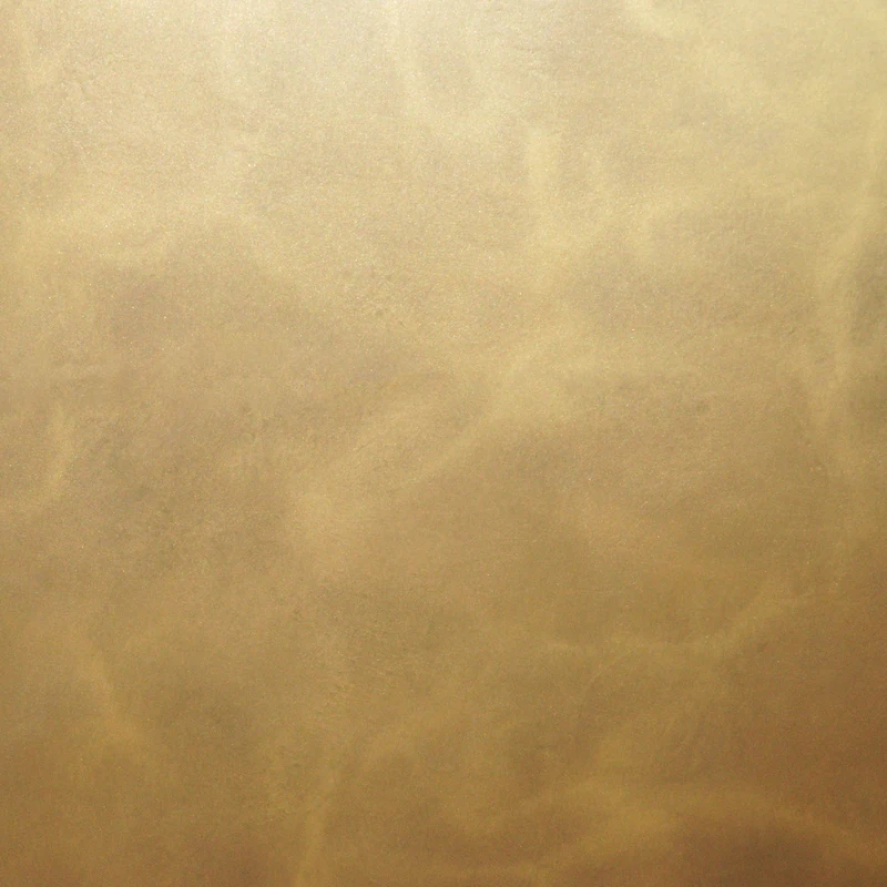 AURO — Warm gold · Clouded surface, original finish photograph